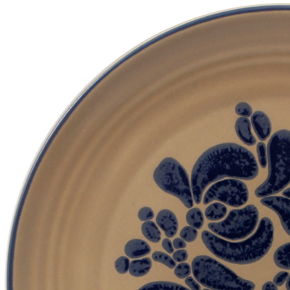 Overhead view of the Folkstone stoneware dinnerware set arranged on a rustic wooden table