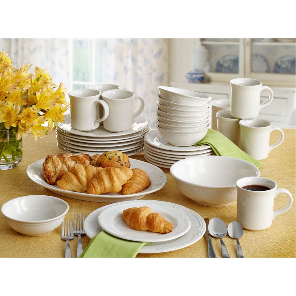 Dishwasher safe barbecue platter elegantly set on a dining table with steaks.