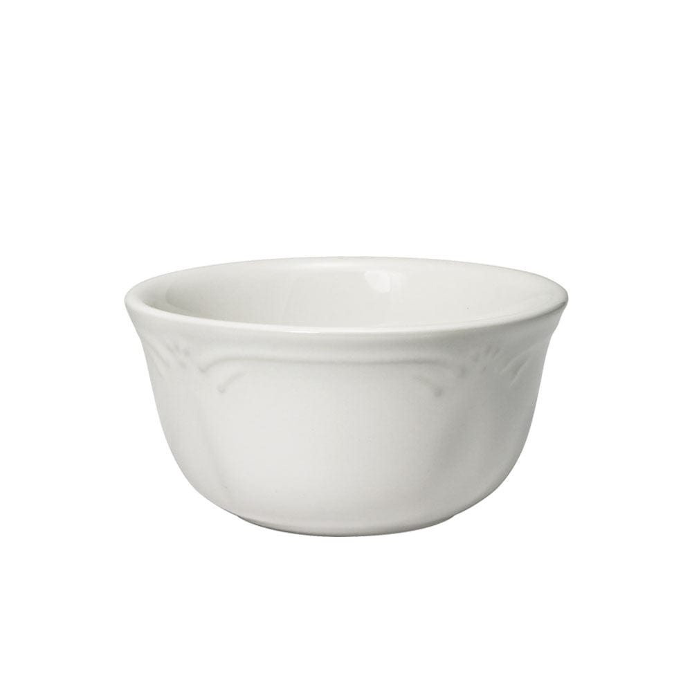 Side view of bowls used for snacks and dips in a cozy home setting
