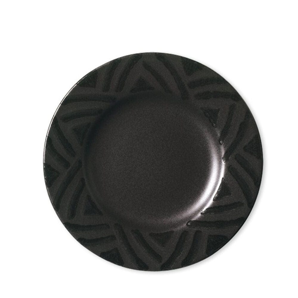 Close-up of Midnight Sun stoneware salad plates stacked on a dining table