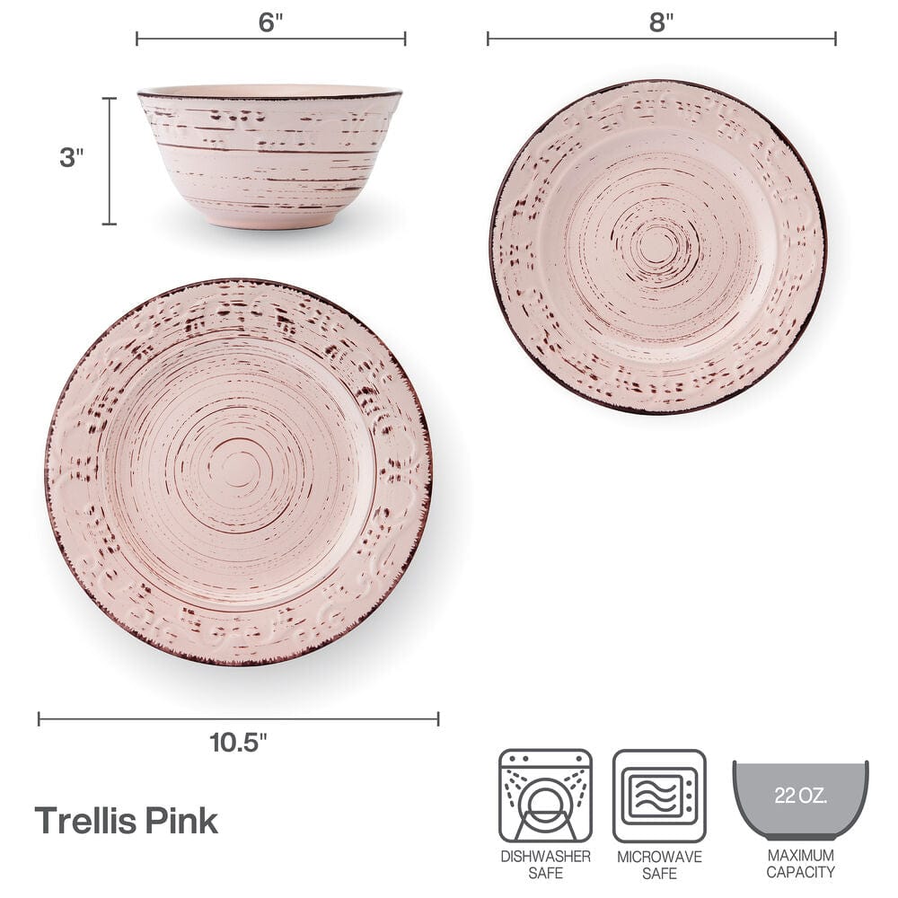 Close-up of the intricate scroll pattern on the pink stoneware dinnerware.