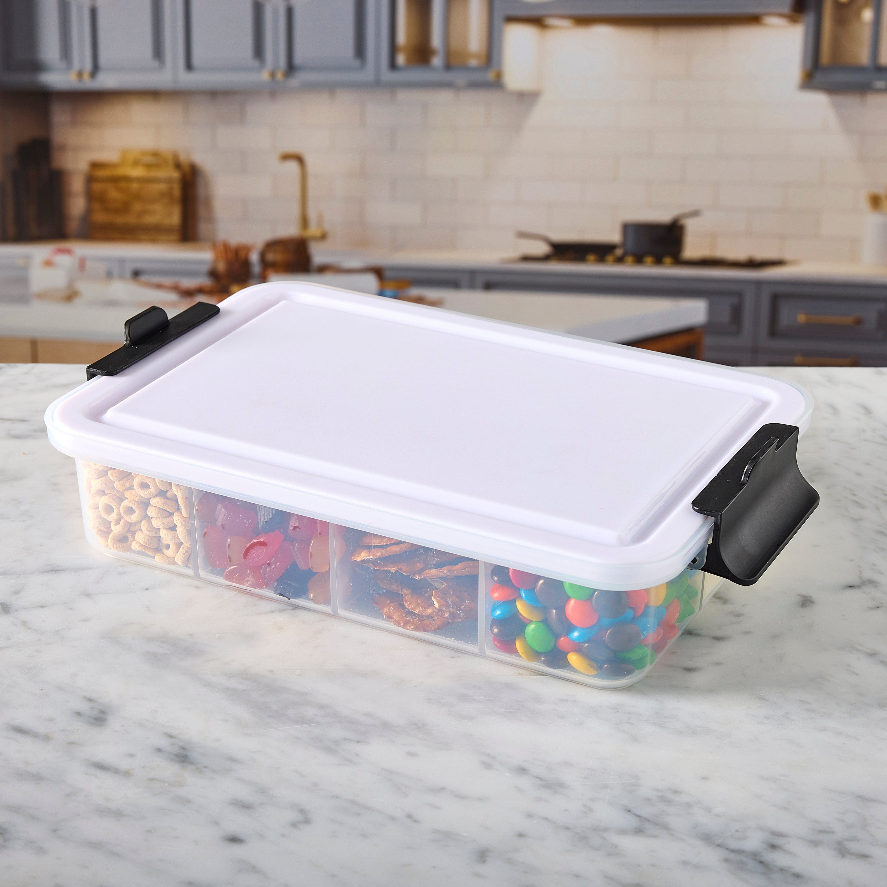Reversible cutting board lid of Farberware snack box, showcasing its dual functionality.