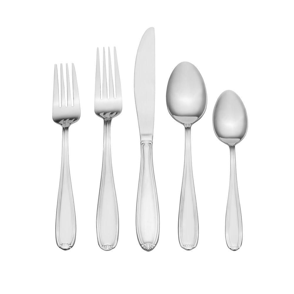 Elegant silverware set for weddings displayed on a beautifully set dinner table, ready for use