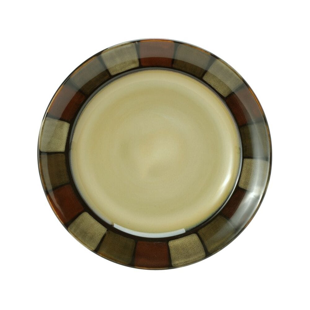 Overhead view of Taos stoneware dishes arranged for a family-style meal