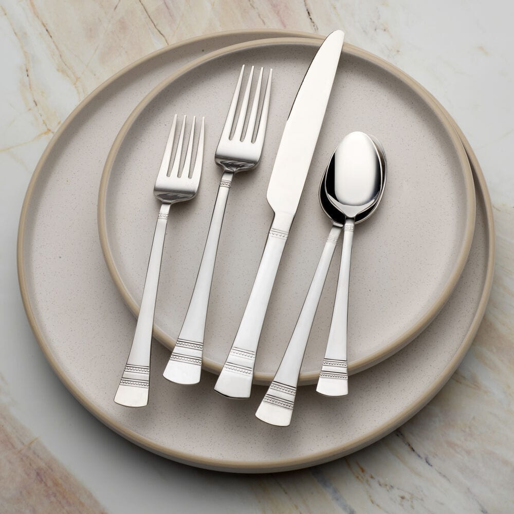 Kensington flatware set with a horizontal bead pattern on handles, ideal for dinner parties