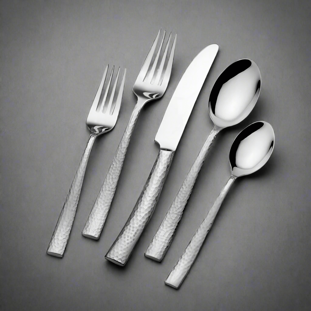 Close-up of textured flatware set for four with modern design