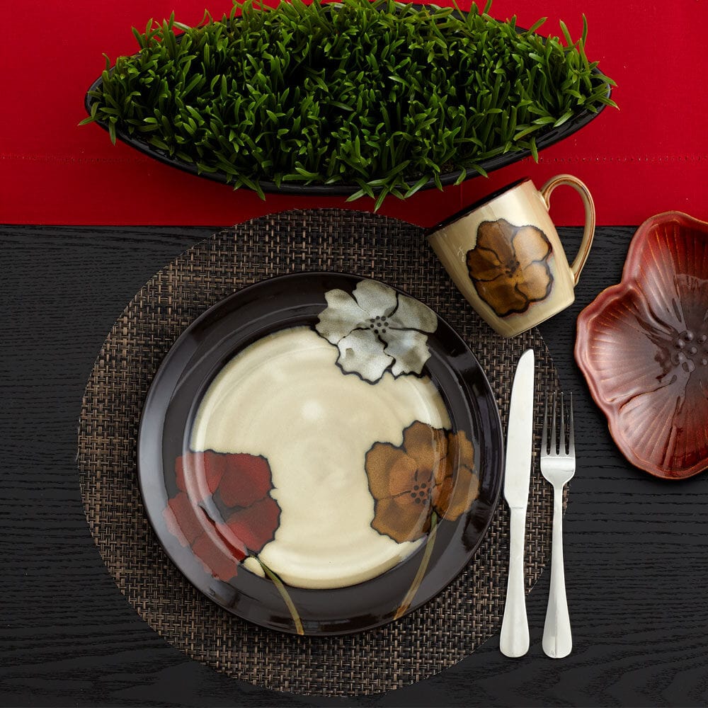 Close-up of the textured surface and glaze variations on a handmade reactive glaze plate