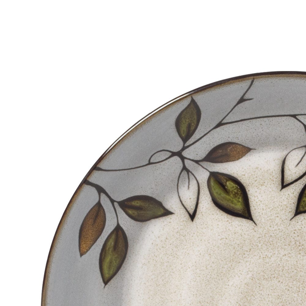 Rustic Leaves stoneware dinnerware set for 8 with plates and bowls on a rustic table