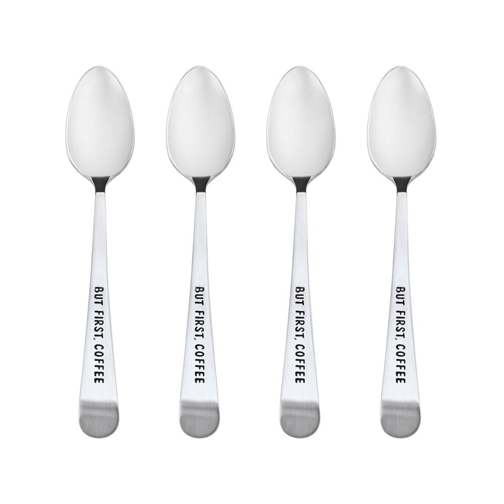 Set of 4 But First Coffee mini coffee spoons displayed elegantly on a wooden table.