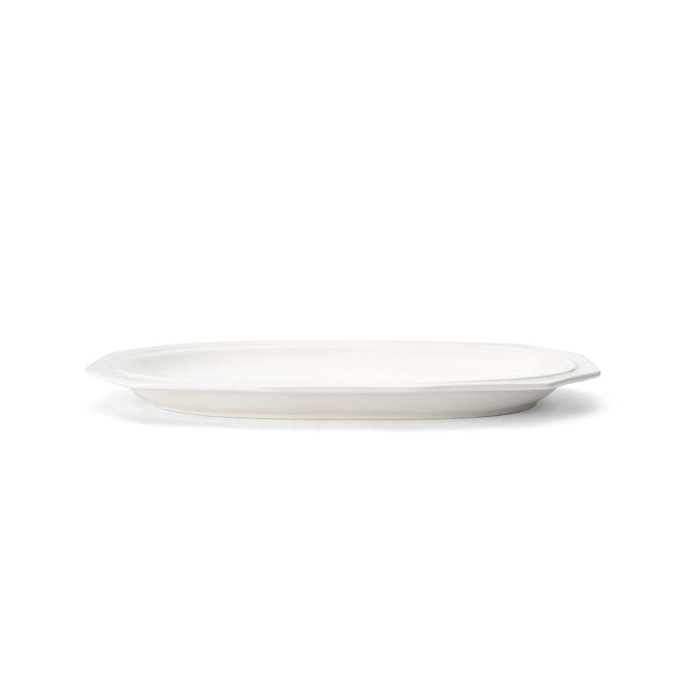 Stylish oval serving platter on a dining table for entertaining