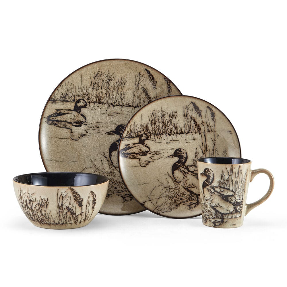 Close-up of stoneware dinnerware with unique reactive glaze, perfect for outdoor dining.