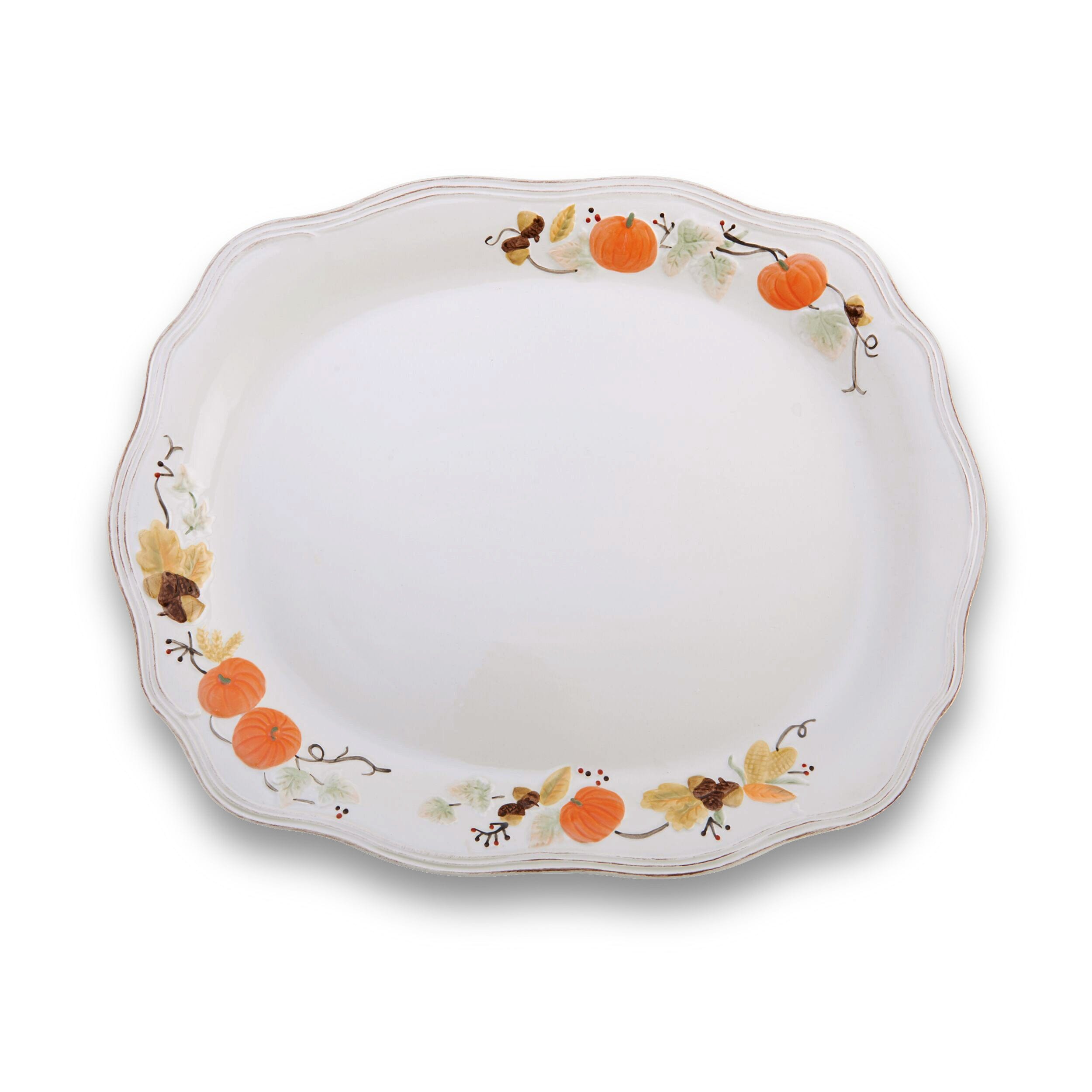 Serving a roasted turkey on a stylish oval ceramic platter for Thanksgiving