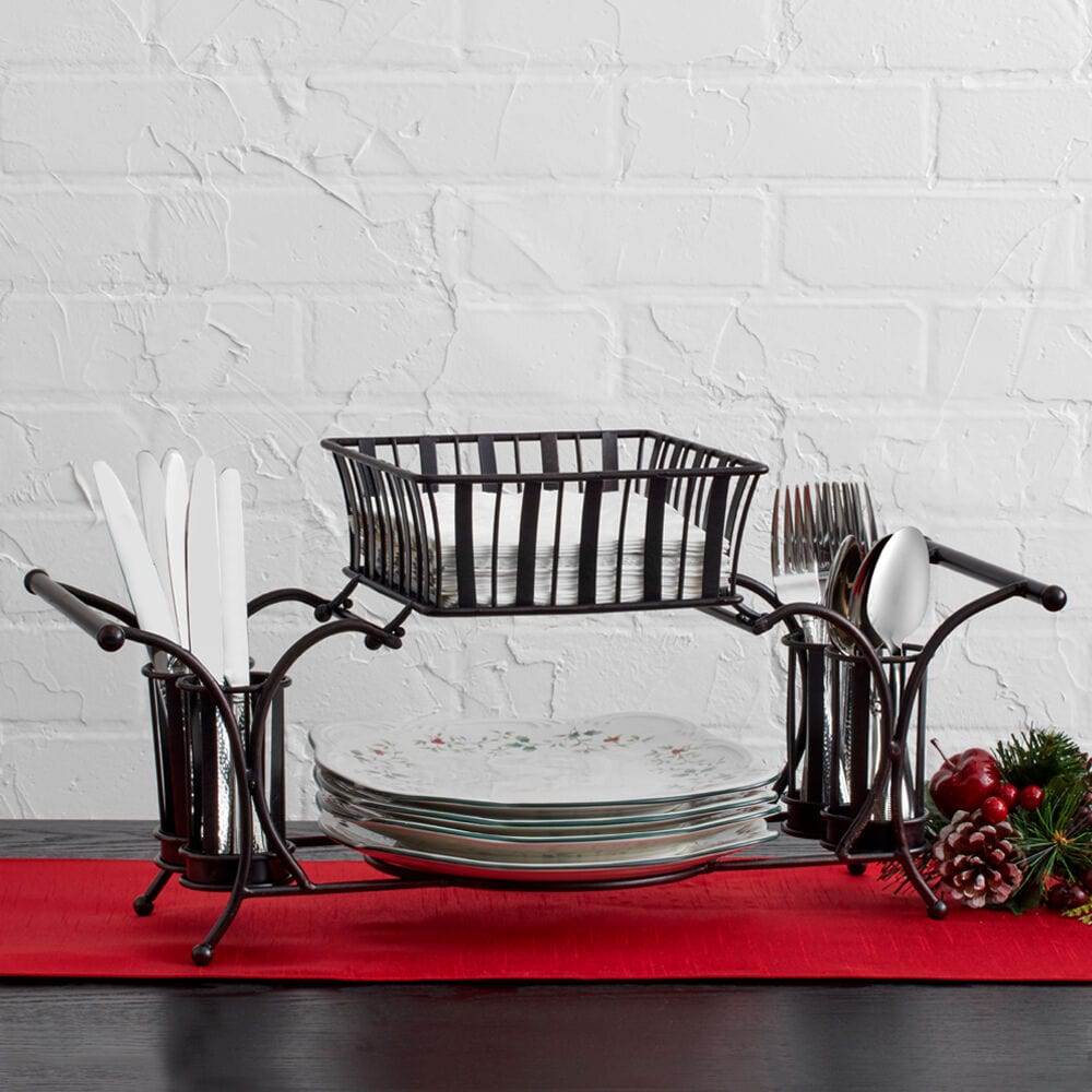 Buffet caddy with flatware compartments and napkin holder on a banquet table