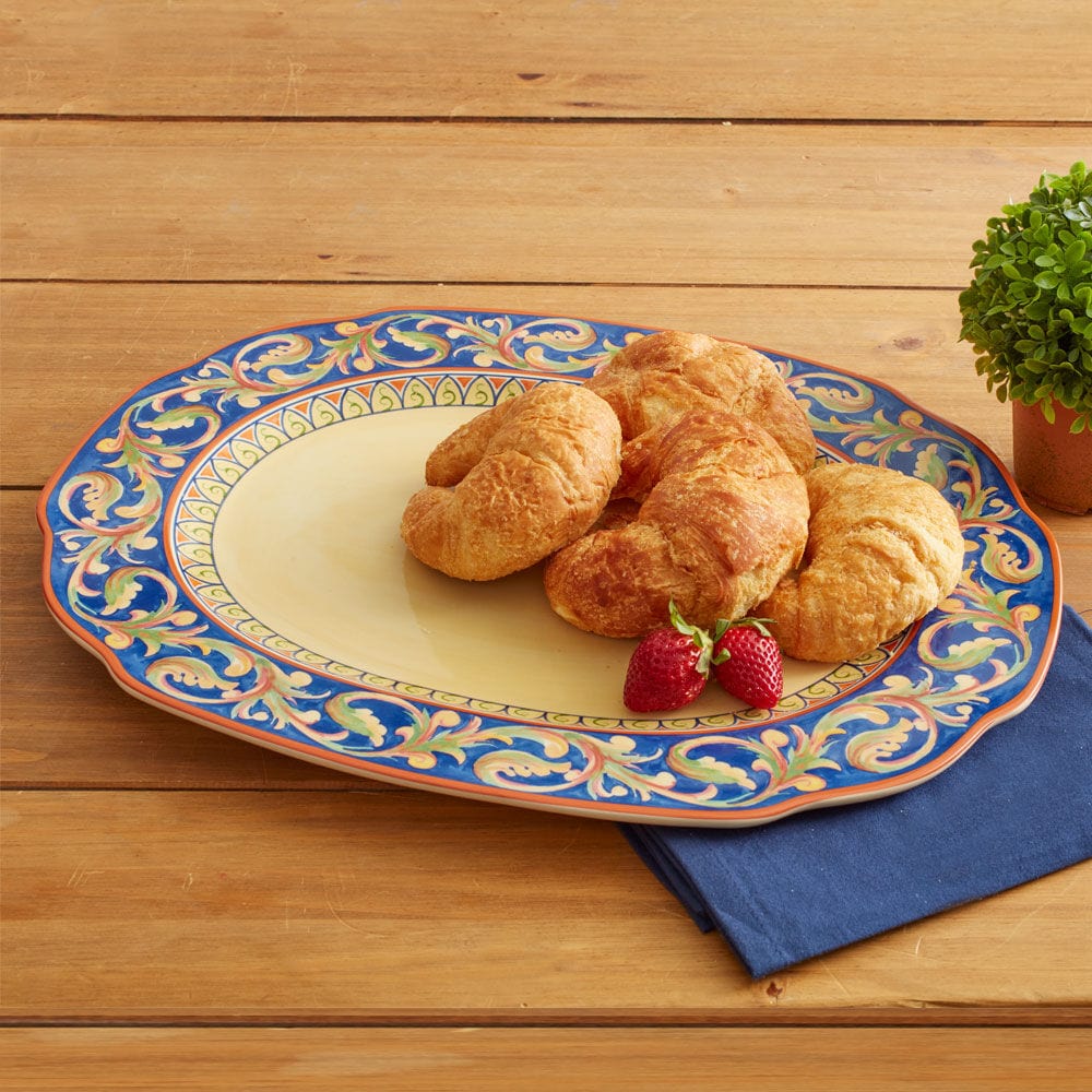 Front view of large oval stoneware platter on table, perfect for family dinners