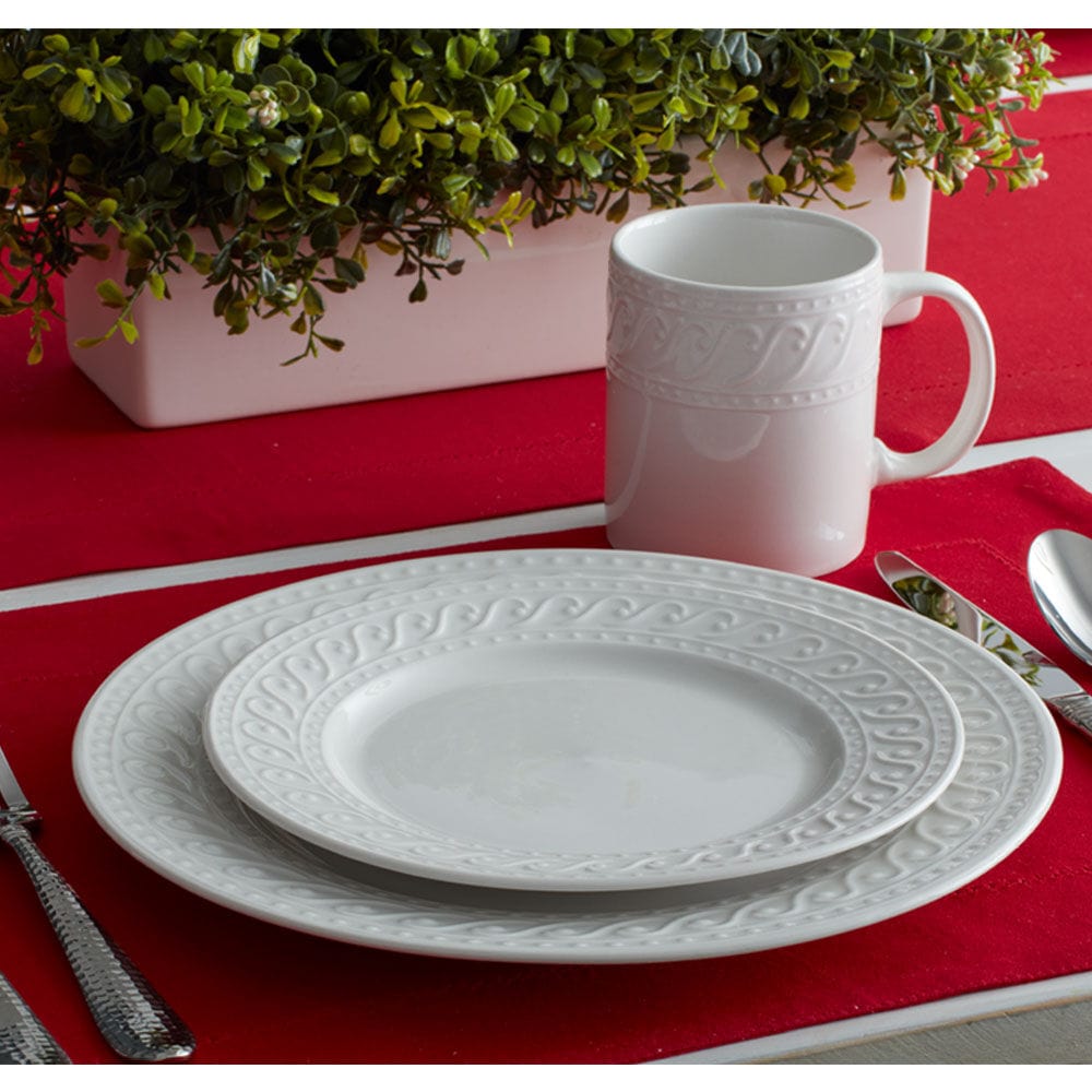 Set of four Sylvia dinner plates on a dining table, ideal for main meals.