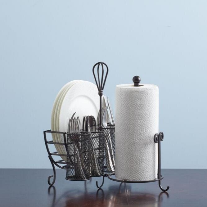 The elegant picnic storage caddy set up on a picnic table, ready for an outdoor meal with friends.