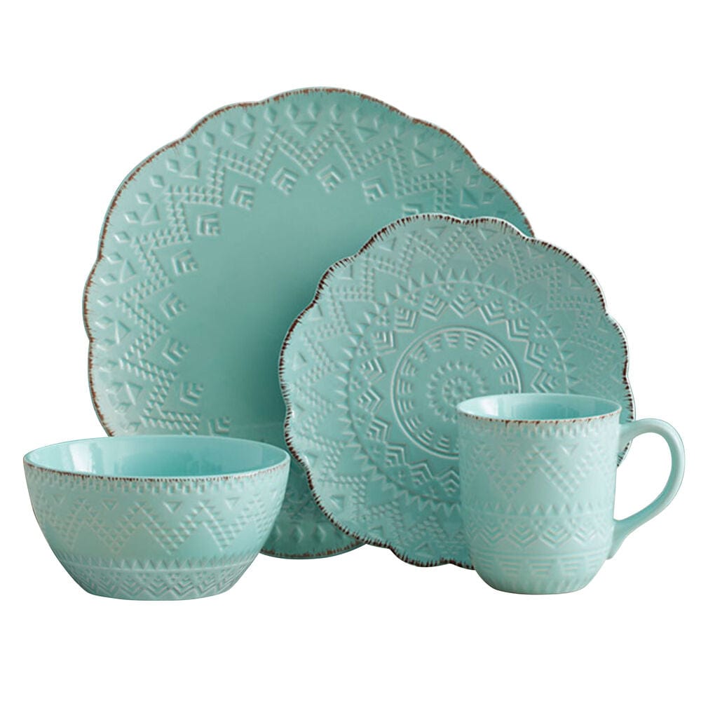 Close-up view of the teal stoneware cereal bowls and dinner plates.