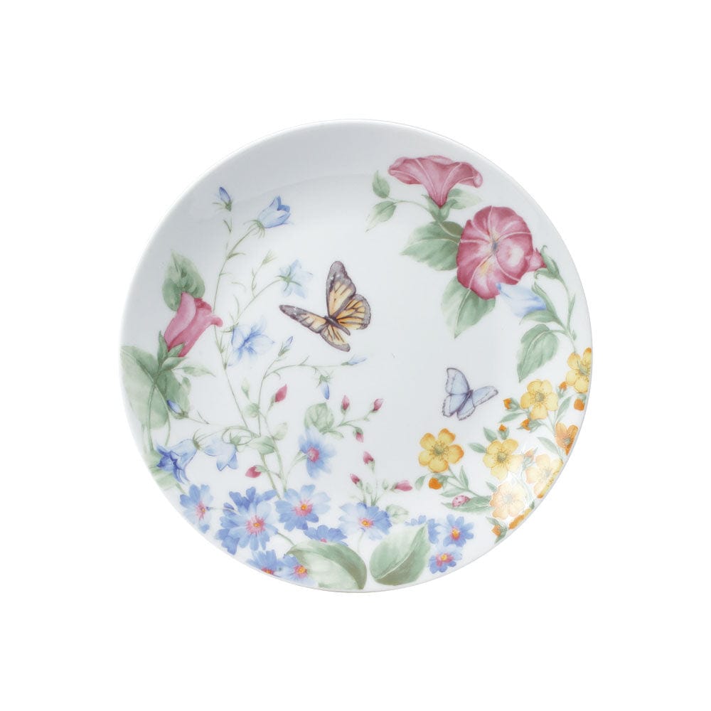 Porcelain salad plates used for serving fresh salads in a modern kitchen