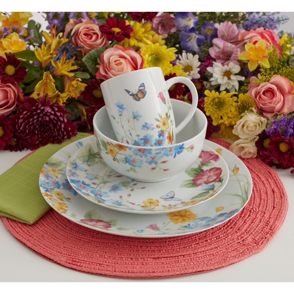 Set of 4 microwave and dishwasher safe porcelain plates displayed for dinner