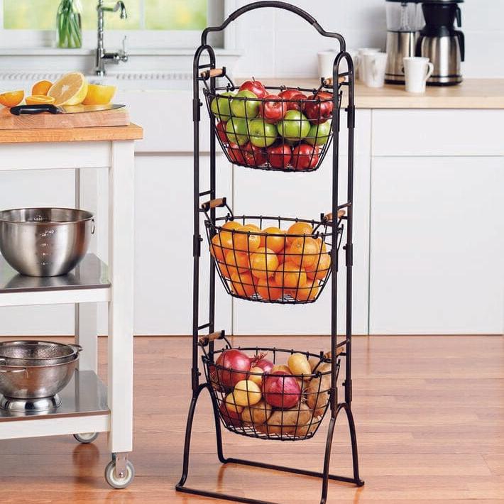 Versatile 3-tier adjustable storage rack in black brushed copper, showcasing baskets filled with household items.