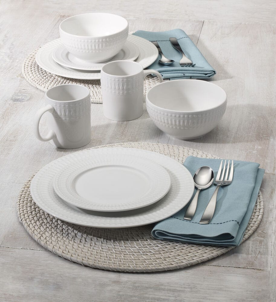 All components of the dinnerware set arranged neatly, highlighting its dishwasher-safe feature.