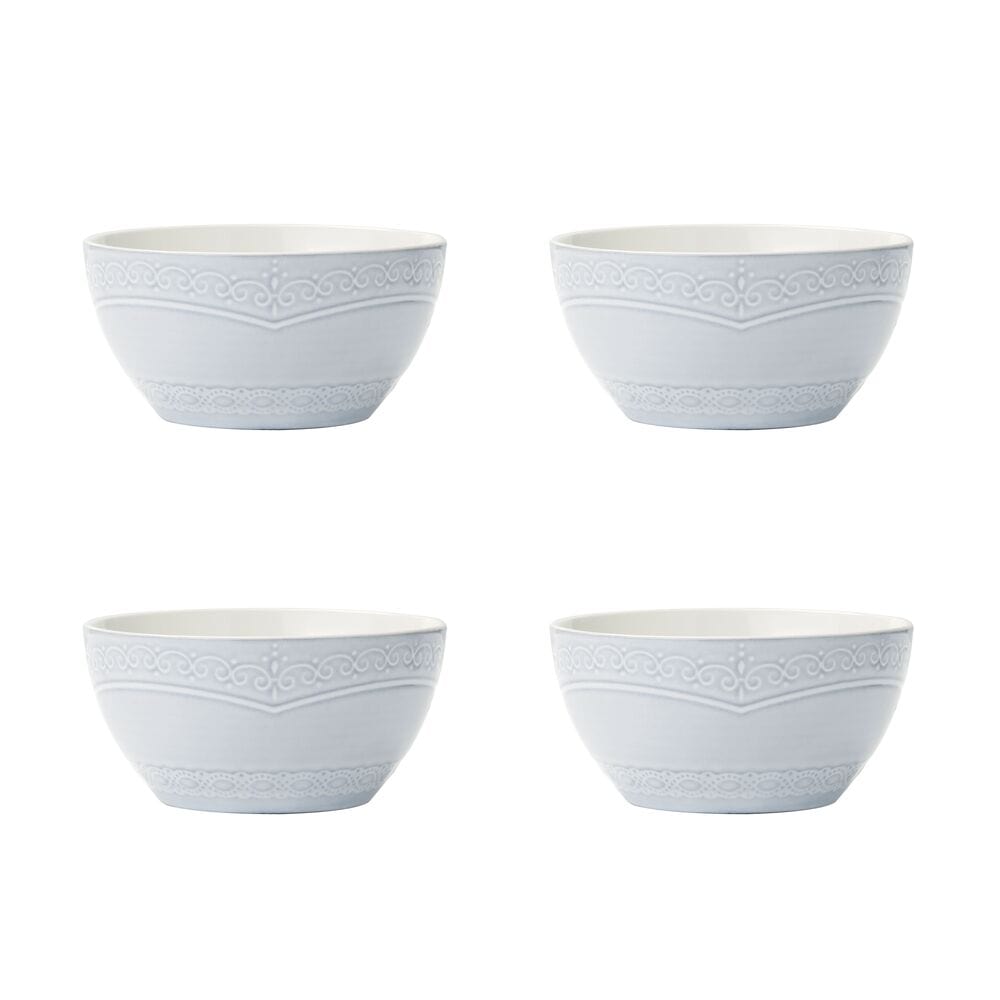 Overhead view of the full dinnerware set arranged for a 4-person service