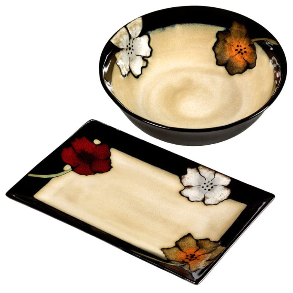 Close-up of serveware set with plates from the Painted Poppies collection, highlighting the vibrant poppy design and glaze texture.