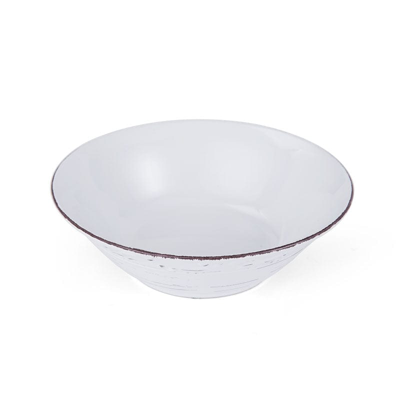 Trellis White vegetable bowl in use, serving a fresh vegetable dish.
