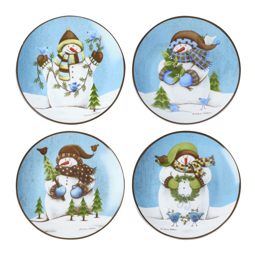 Set of 4 holiday salad plates arranged on festive table setting
