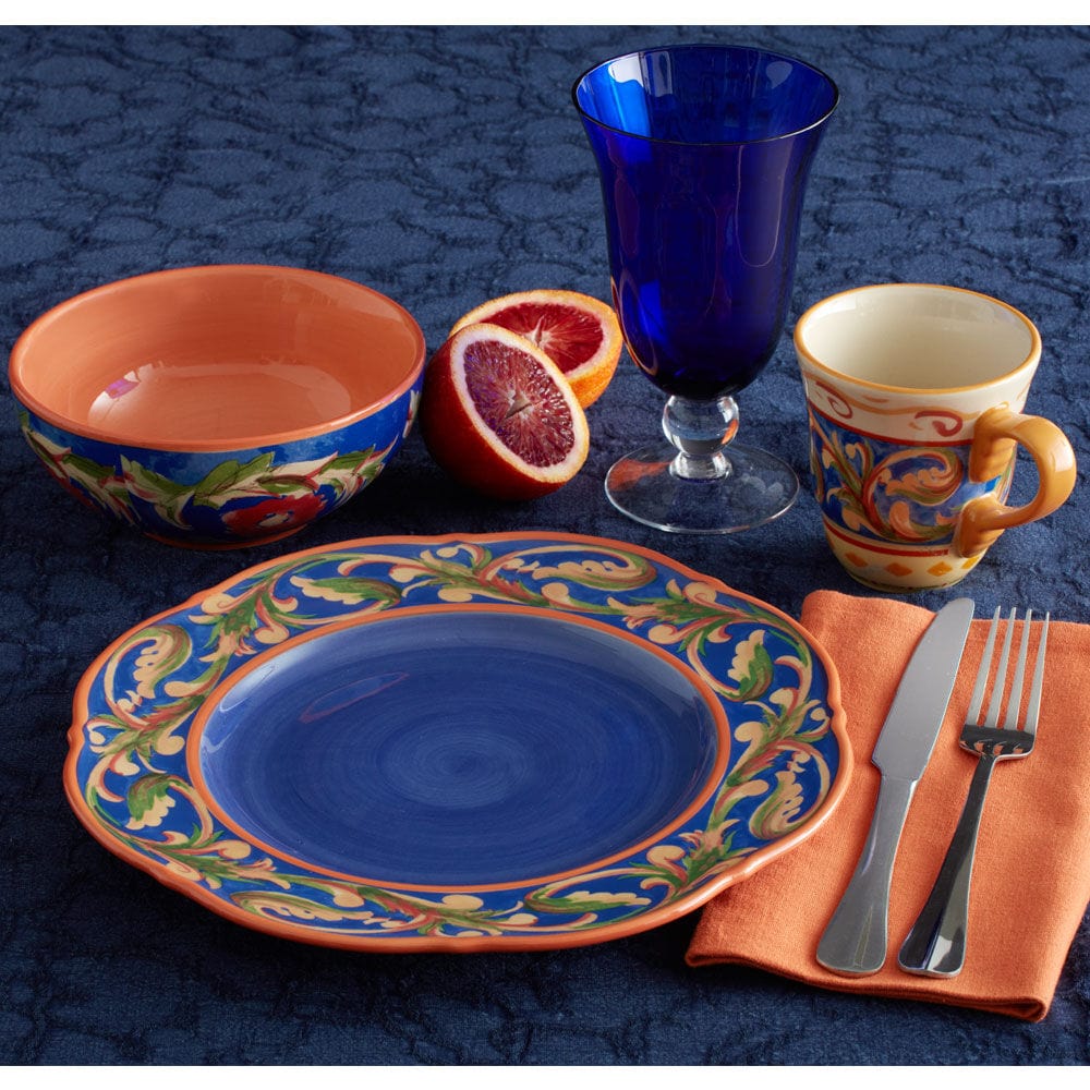 Luna Elegance Scalloped Dinner Plate stacked with other dinnerware, ideal for family gatherings.