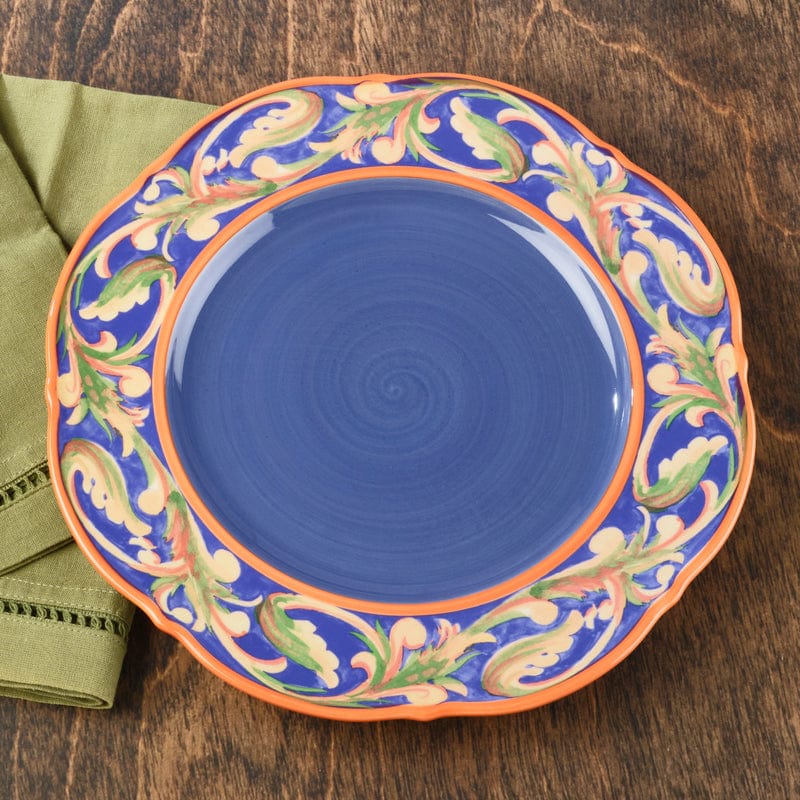 Luna Elegance Scalloped Dinner Plate displayed on a dining table, showcasing its decorative edges.