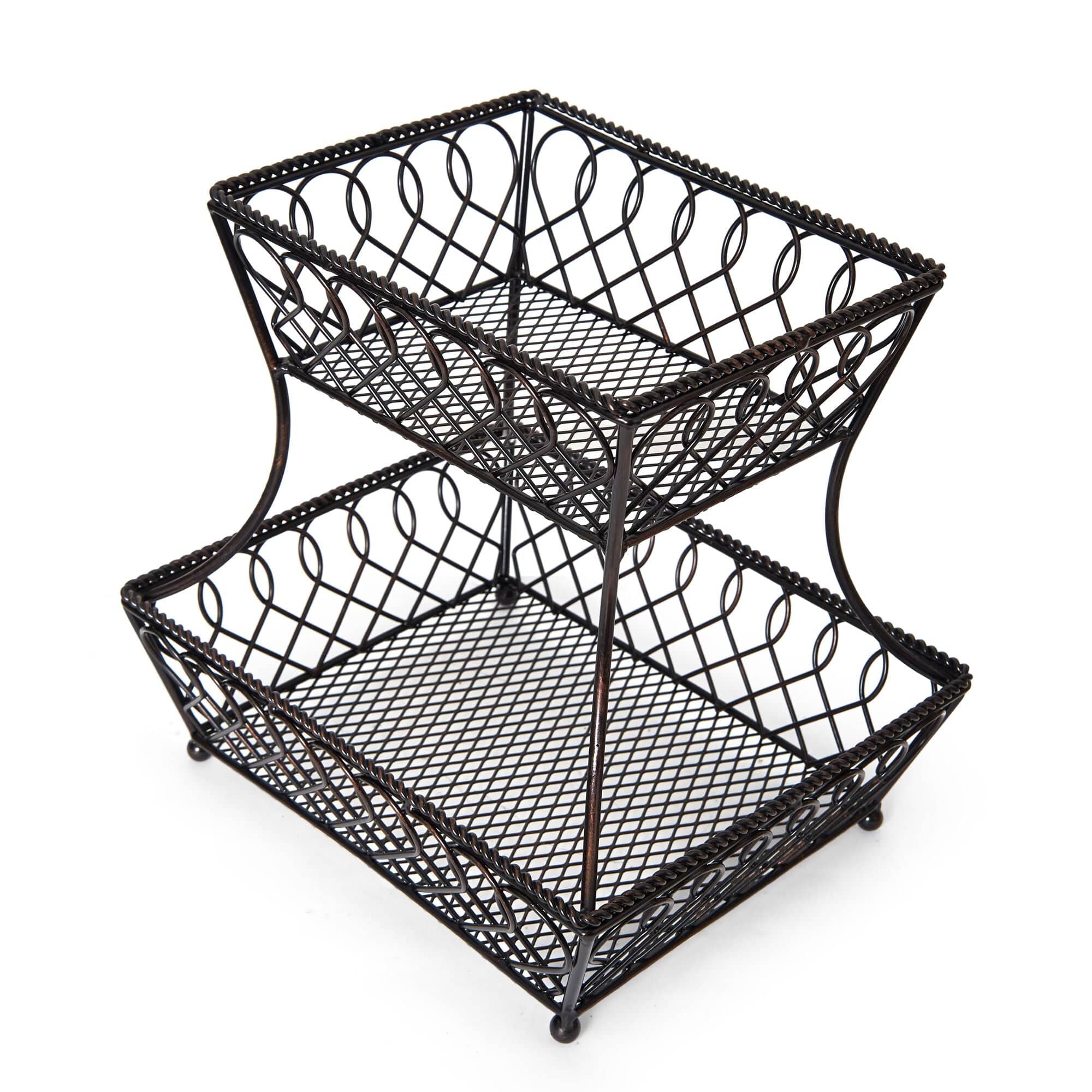 Elegant wrought iron 2-tier kitchen basket showcasing fruits on a countertop.