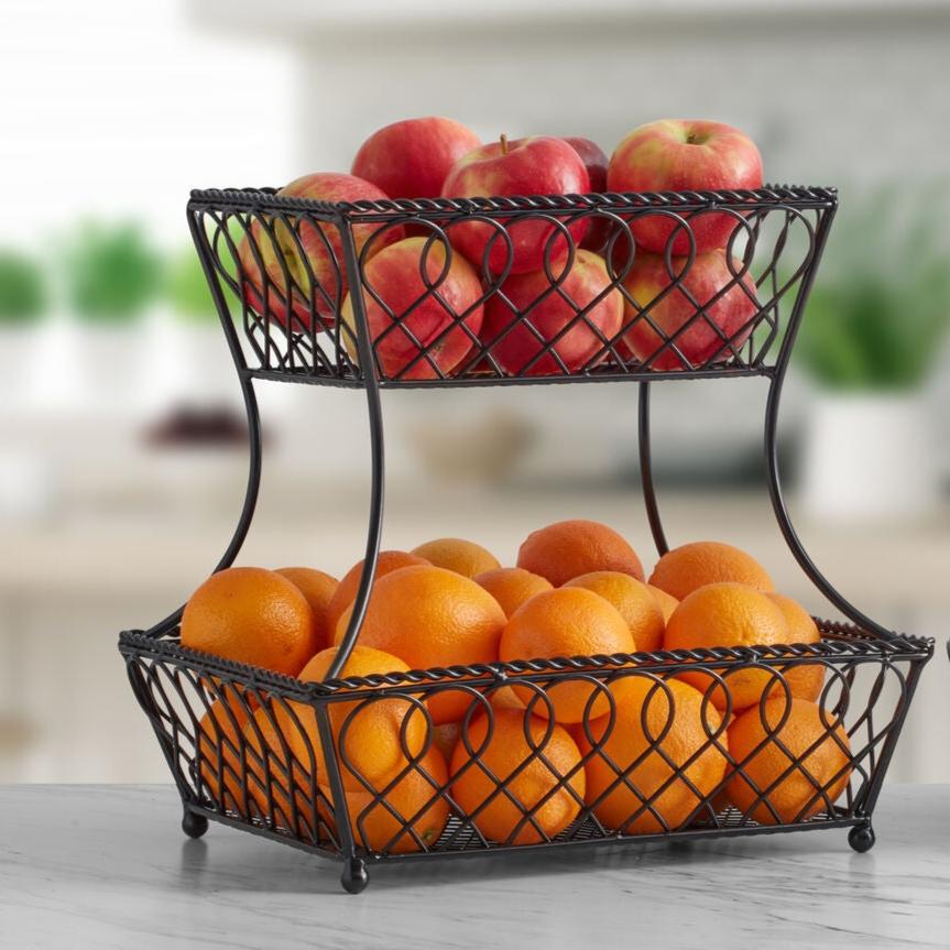 Wrought iron basket filled with kitchen essentials, enhancing decor.