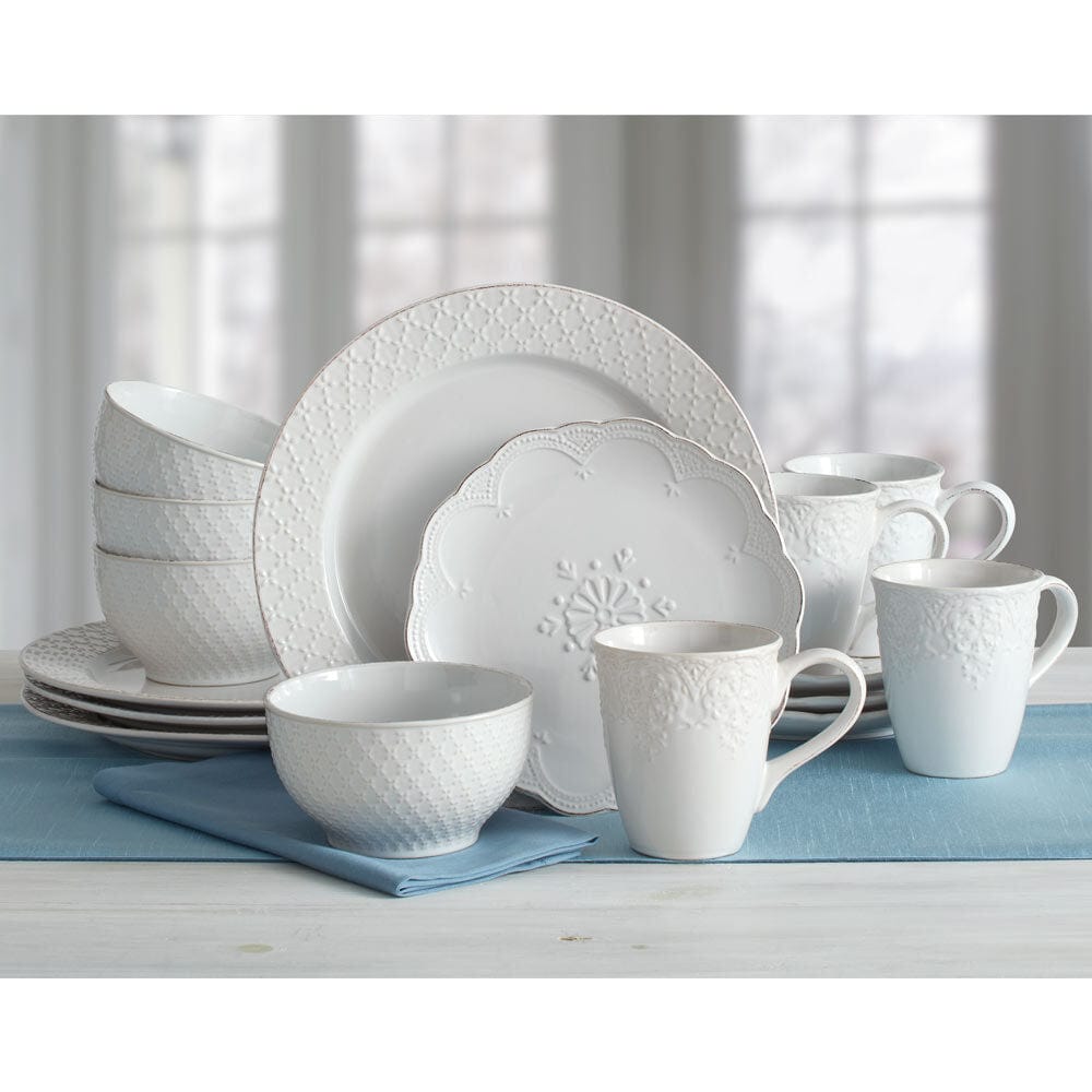 Dining table set with the white dinnerware, perfect for a wedding banquet or family gathering.