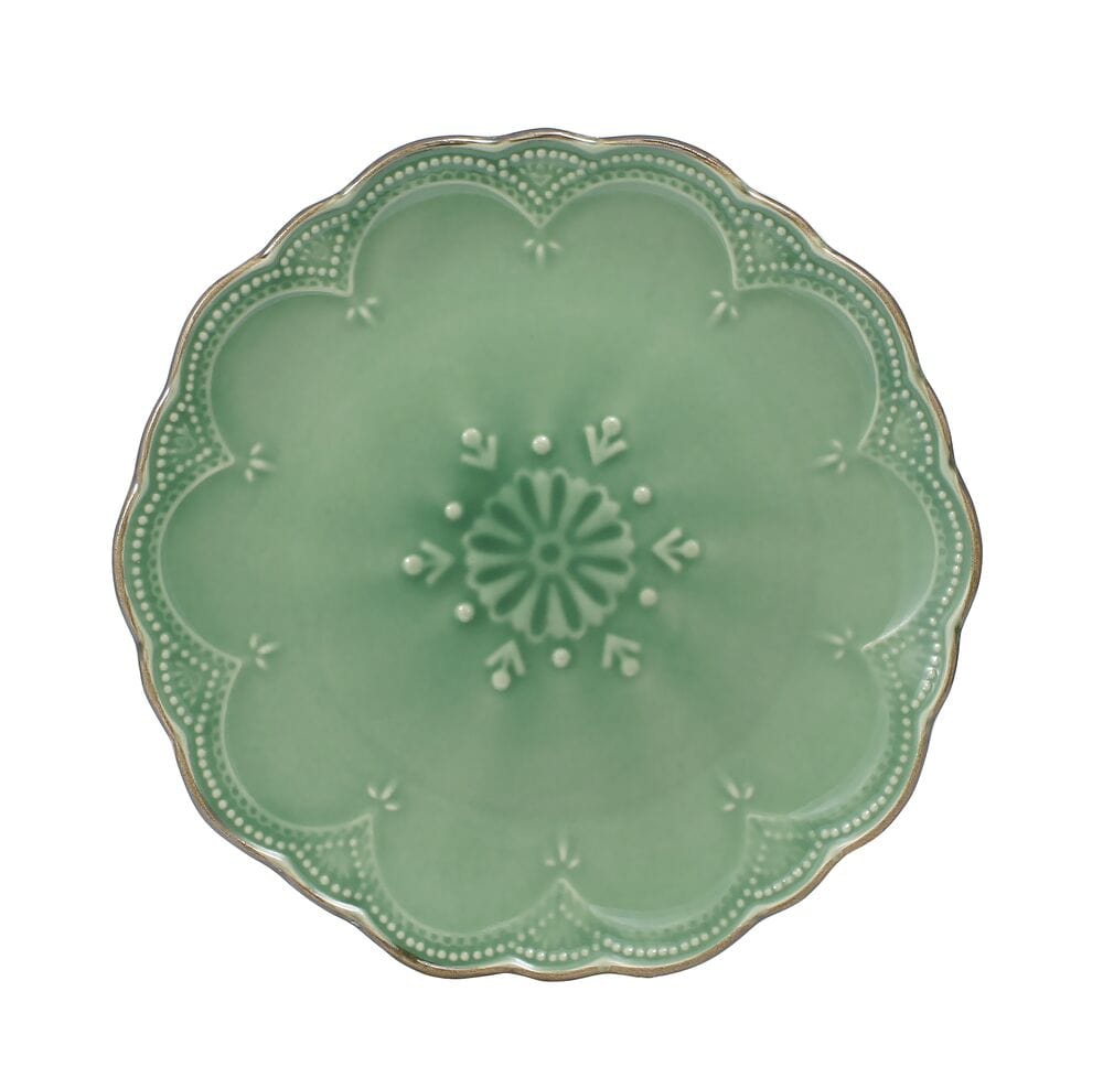 Set of 4 green salad plates on dining table - versatile for any meal.