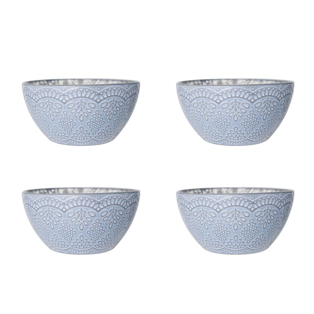 Gabriela Gray dinnerware set showcasing floral design and scalloped edges on a dining table.