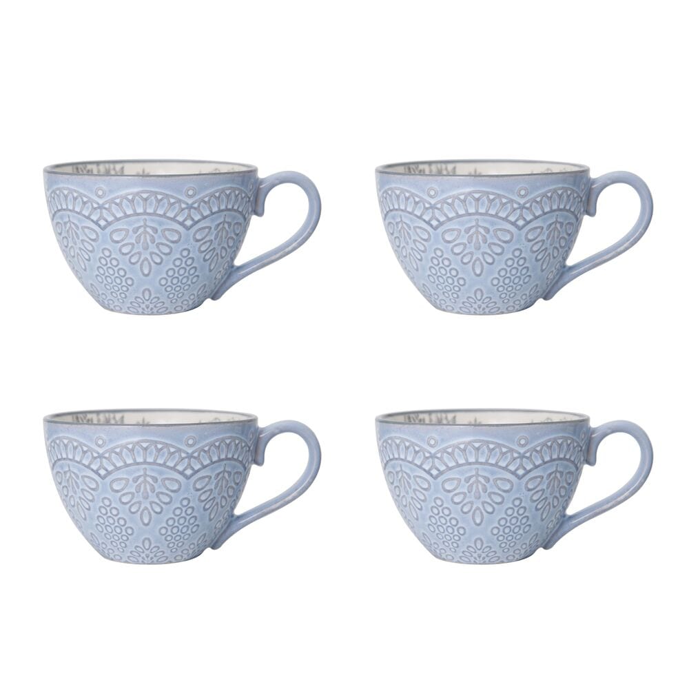 Beautifully arranged affordable dinnerware set for four, demonstrating everyday use in a kitchen setting.