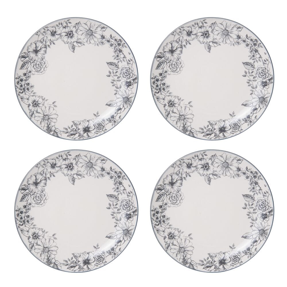Beautifully arranged affordable dinnerware set for four, demonstrating everyday use in a kitchen setting.