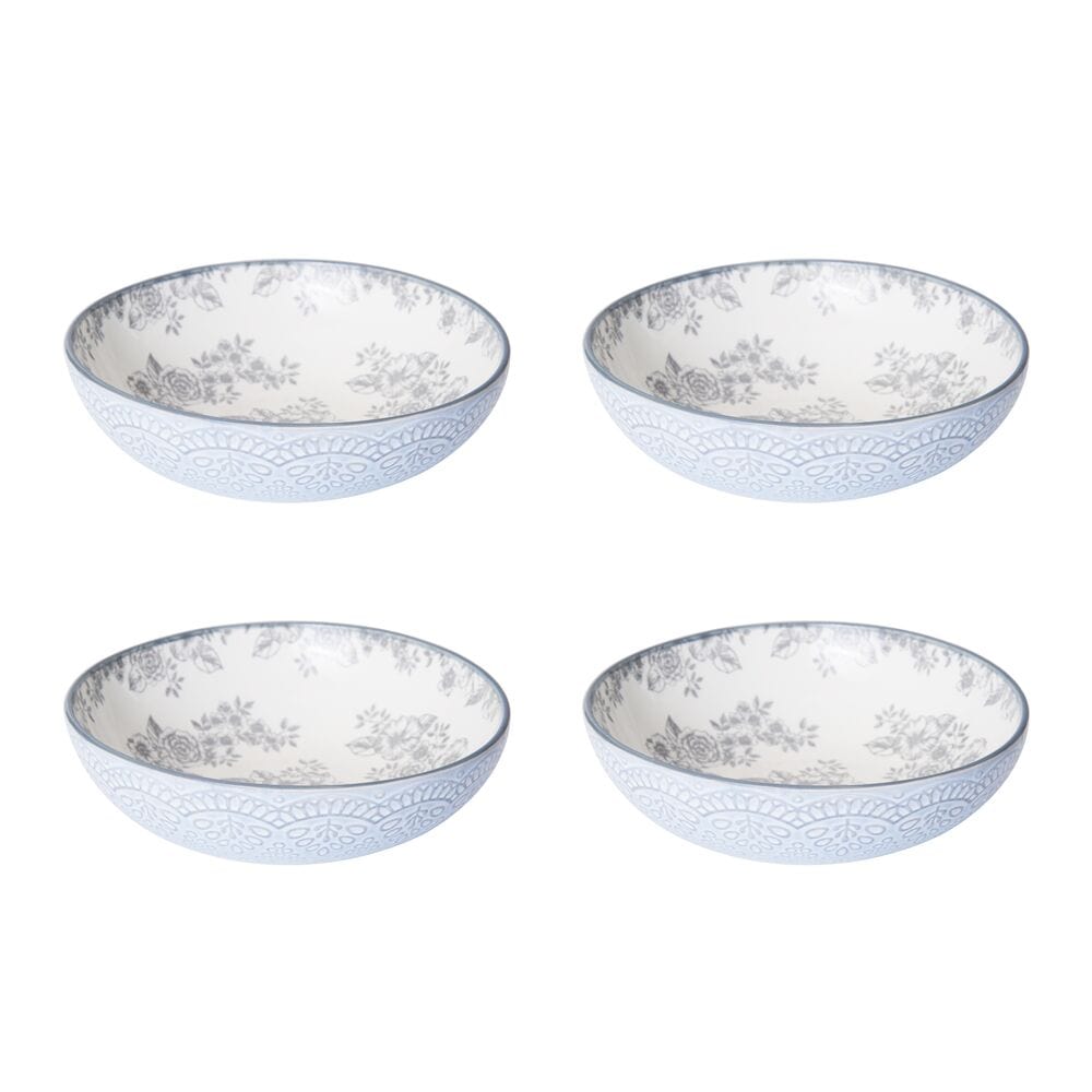Beautifully arranged affordable dinnerware set for four, demonstrating everyday use in a kitchen setting.