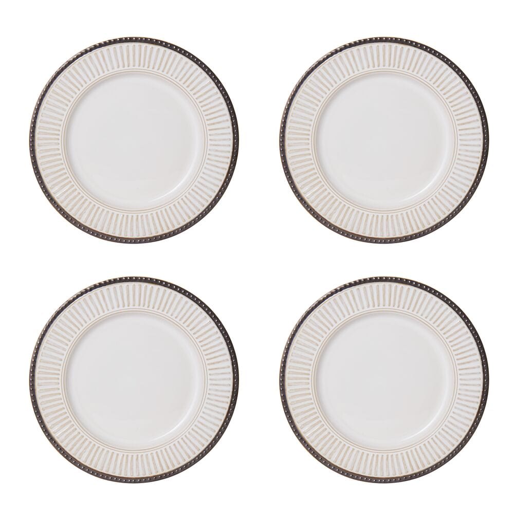 Close-up of stoneware dishes with dinner, salad, and soup bowls for family use