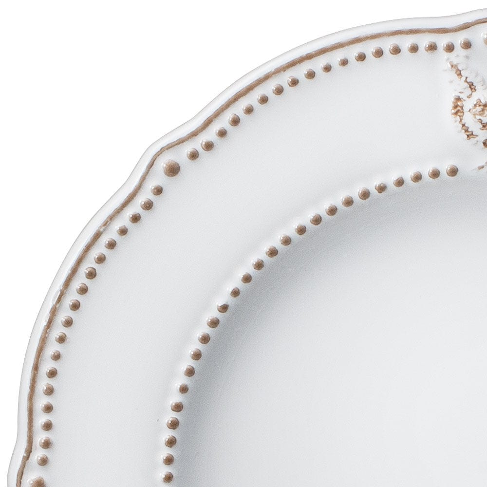 Close-up of farmhouse hen dinnerware set with stoneware dinner plates and mugs