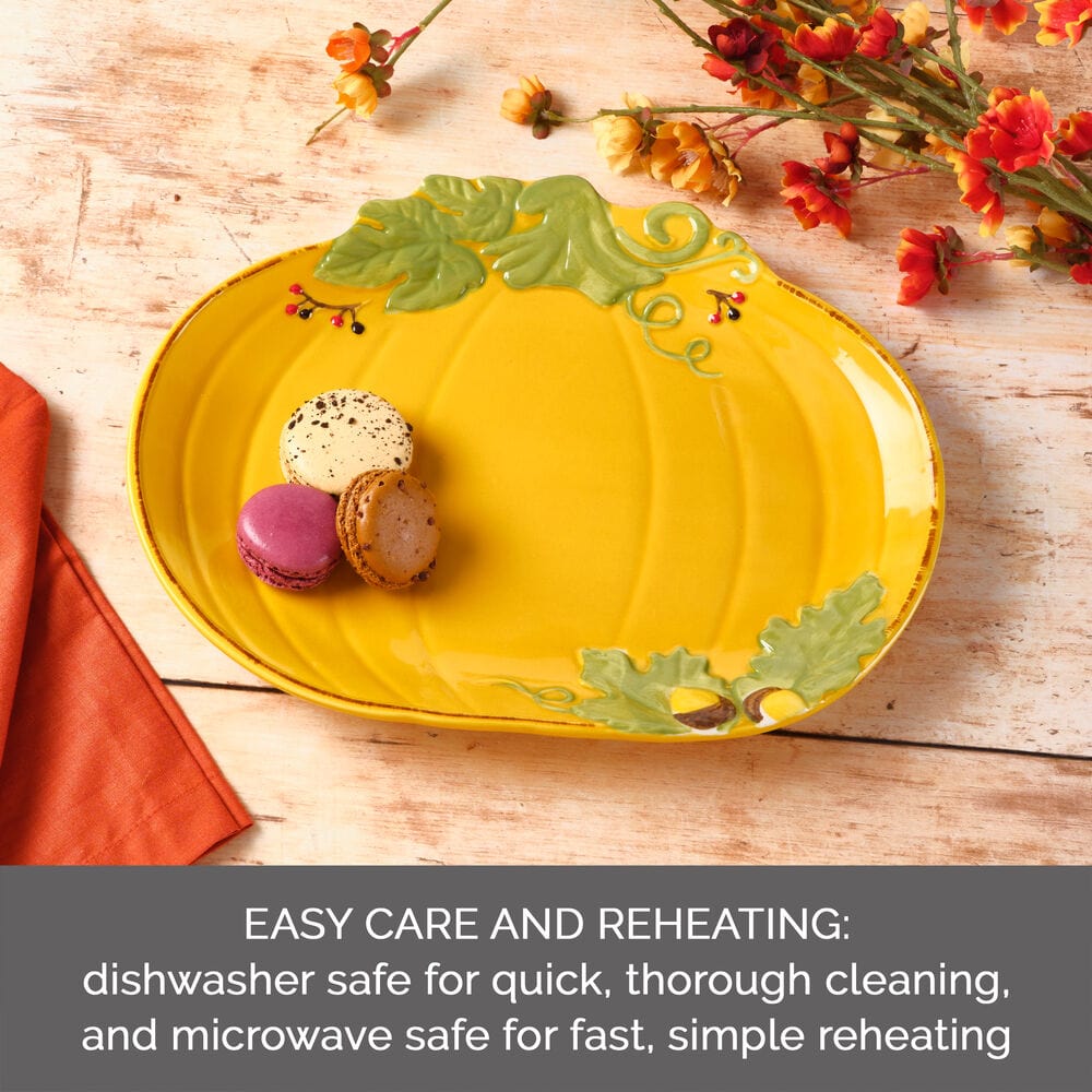 Front view of large pumpkin serving platter with fall leaf accents