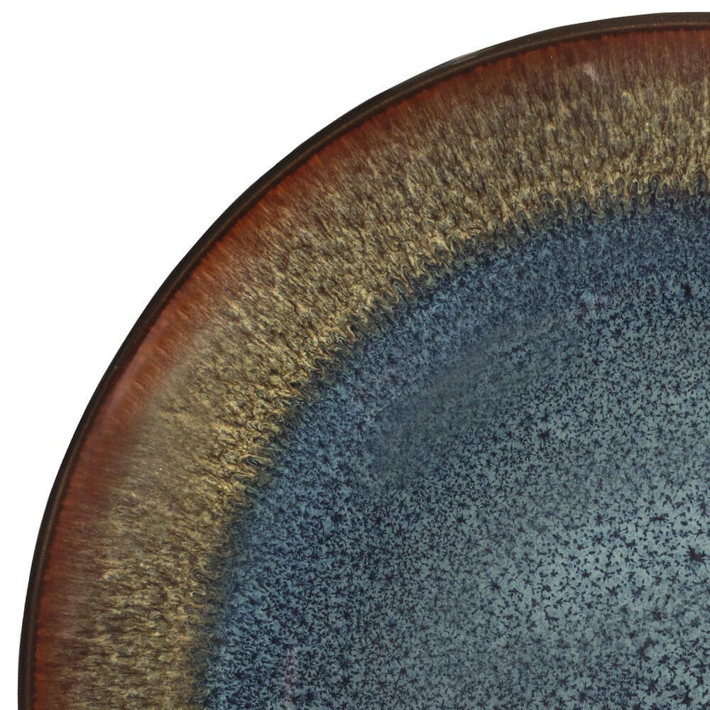 Monroe Blue dinner plate showcasing speckled blue center and earthy rim design.