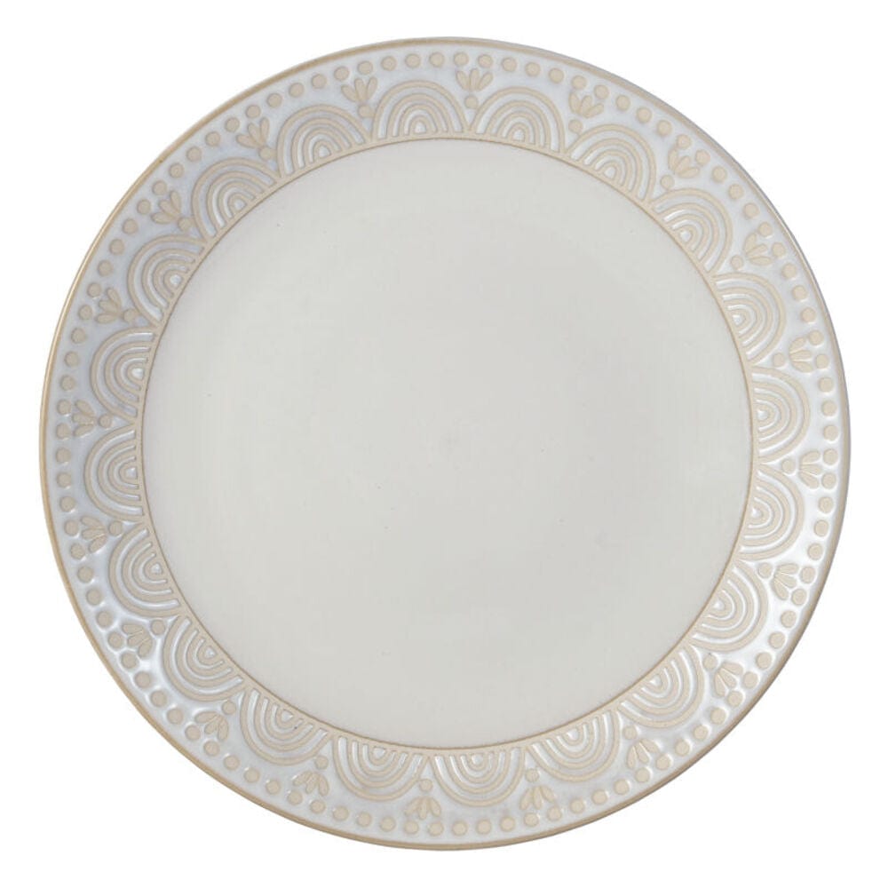 Close-up of the scalloped pattern detail on the salad plate, highlighting texture and glaze