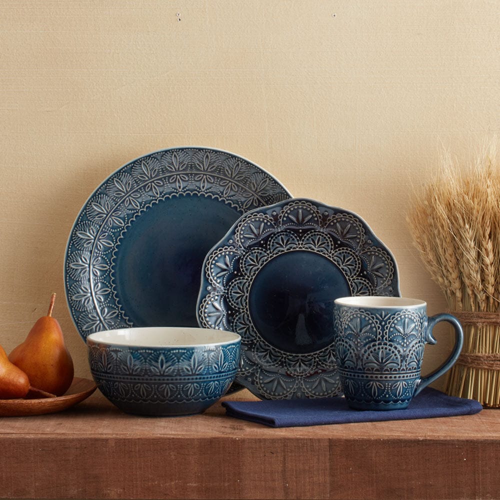 Close-up view of Havana blue stoneware dinner plate with embossed design