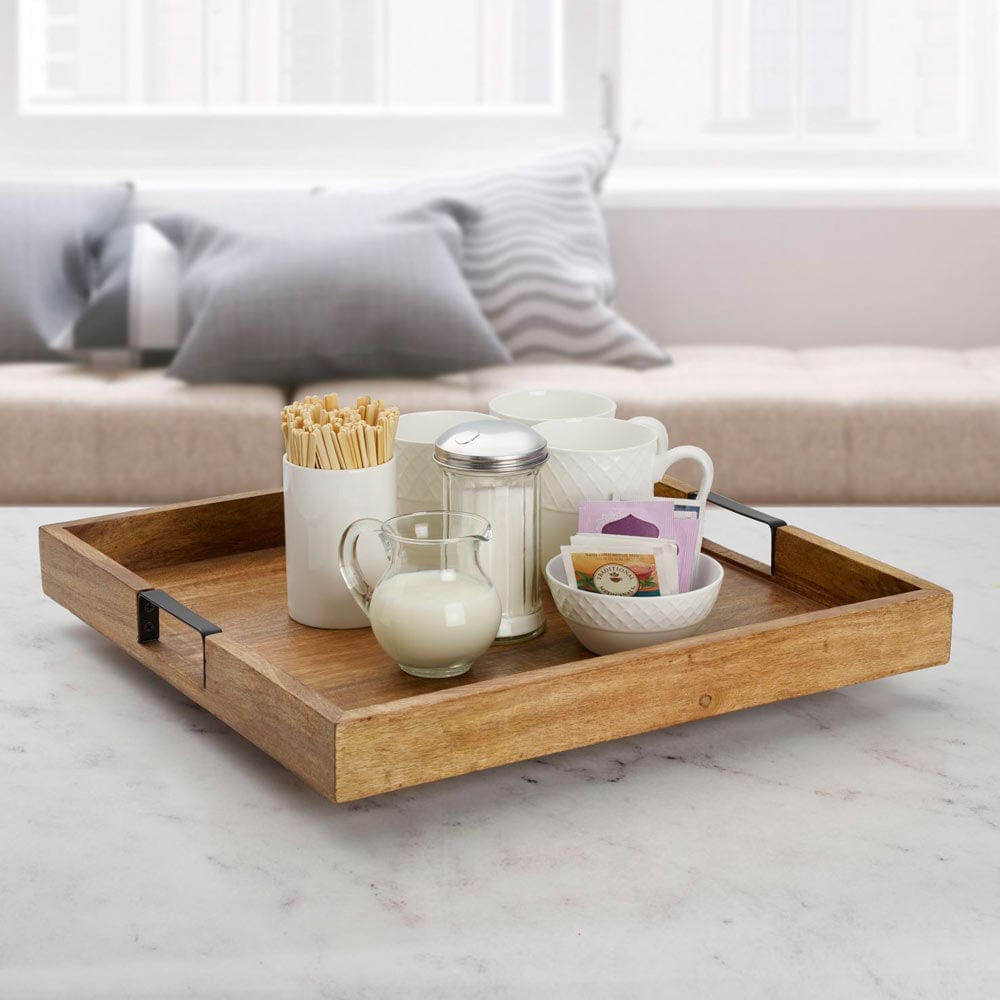 Serving tray in use during a dinner party, holding various bowls and dishes
