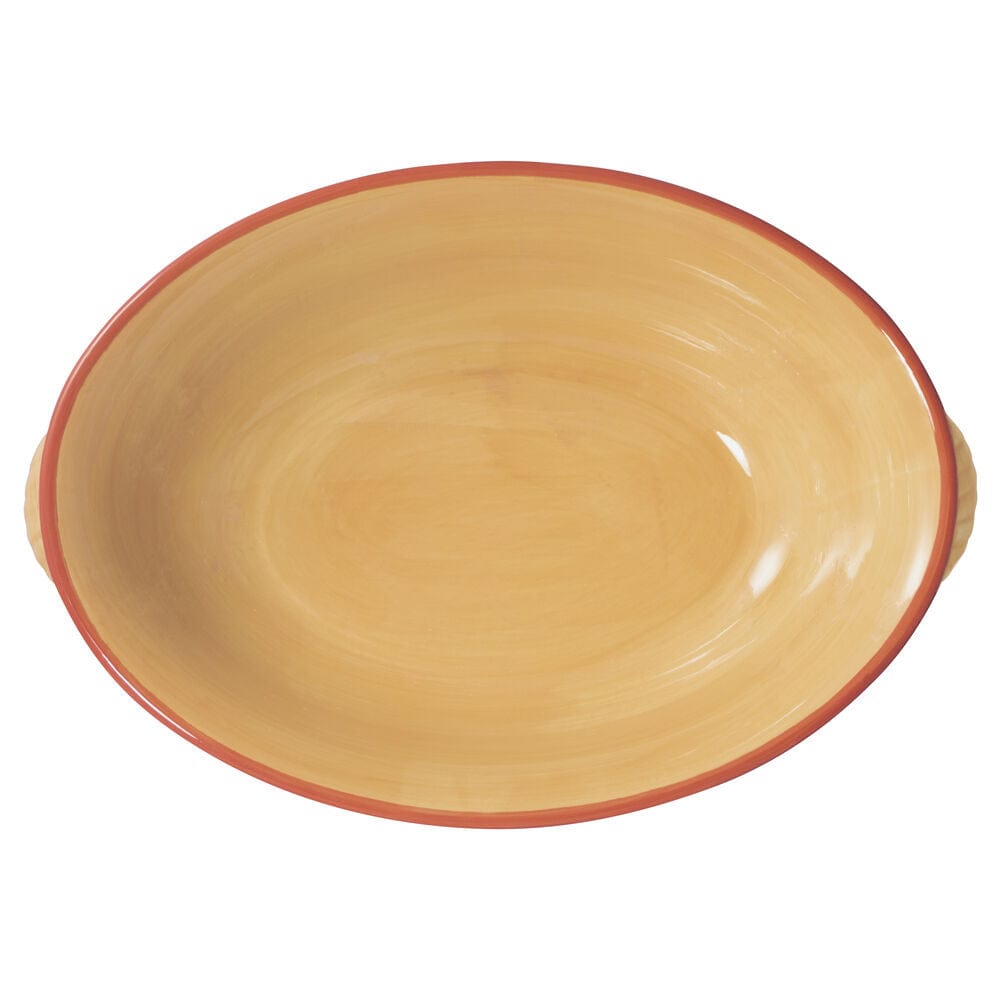 Stylish oval serving bowl set on a dining table, ideal for family gatherings.