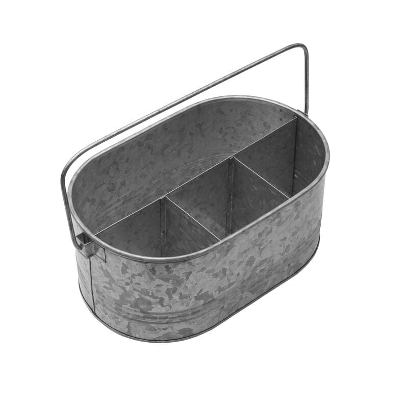 Rustic metal caddy holding utensils, napkins, and condiments for backyard BBQs