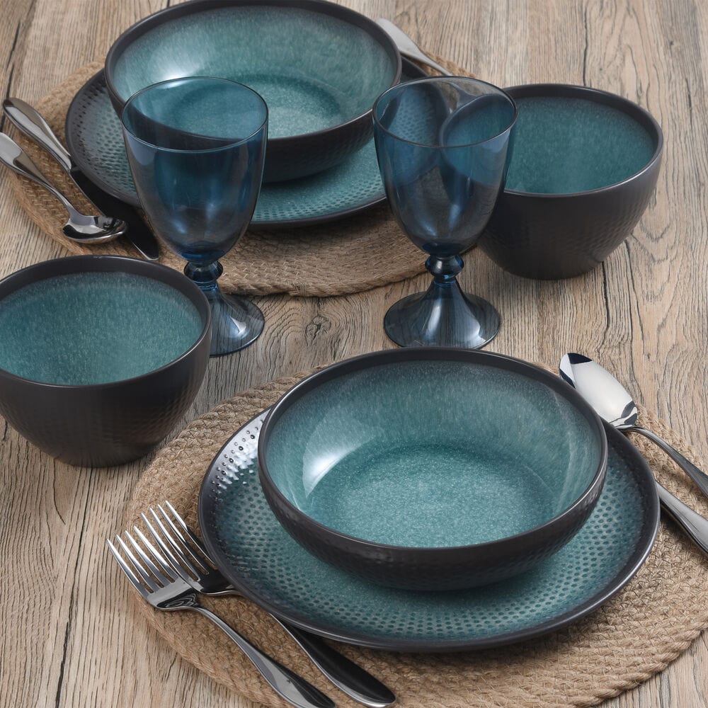Maddox 12-piece dinnerware set showcasing unique colors and patterns for a stylish table setting.