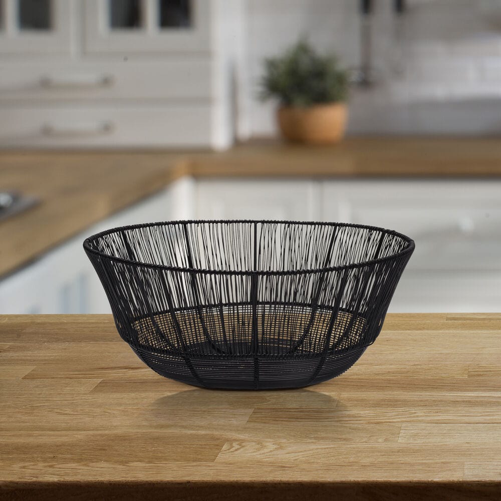Modern Wire Fruit Basket by Jaxon filled with fresh fruits on a kitchen countertop.